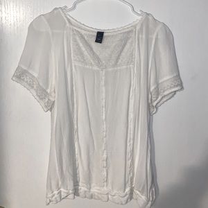 White shirt sleeve blouse with textured detail
